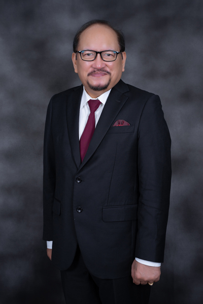 Dr. Christian Johan Lasut, M.Div.,M.Th.,Th.M. (Ketua STT Basom)